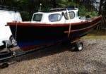 15ft Fishing Boat Project - Photograph of a project fishing boat on a trailer.